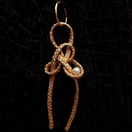 Large Alpine Butterfly Knot Earring with resting pearl (single earring)